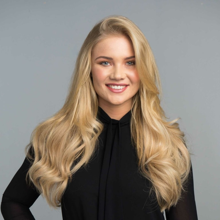 After picture of a woman with long blond hair