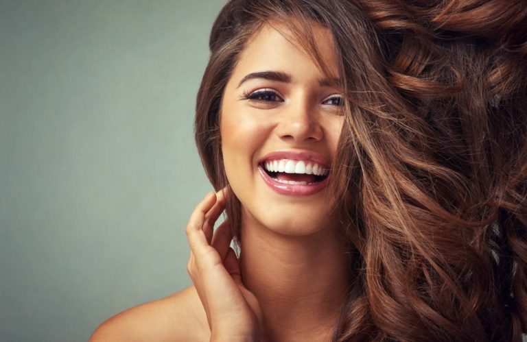 Happy woman with long brown Hairdreams hair