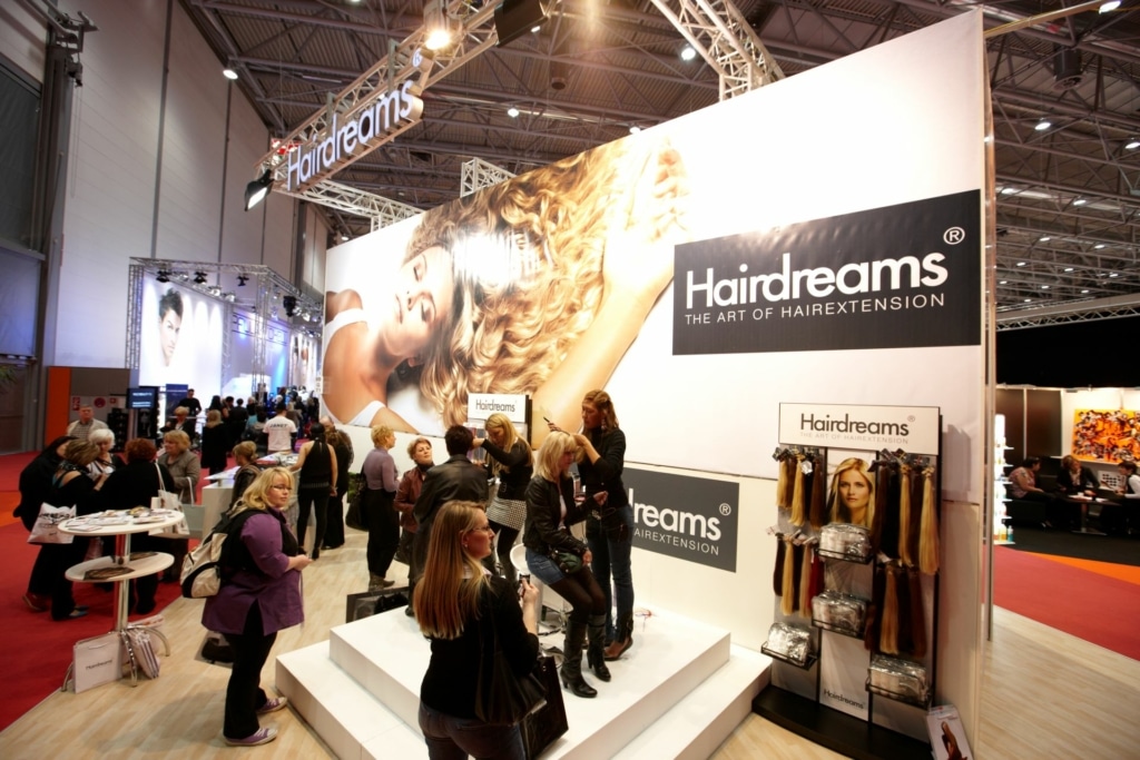 Incorporation of Hairdreams extensions live at a hairdressing fair.